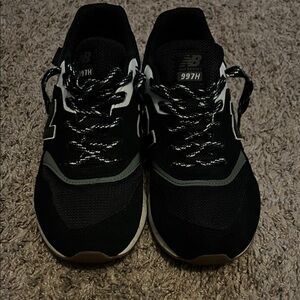 New Balance women’s Black and White 997H Sneakers